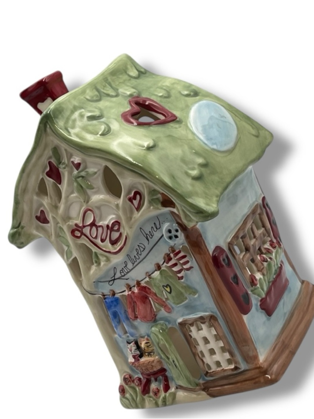 Blue Sky Clayworks
"Love Lives Here" Ceramic
Candle House by Heather Goldminc
